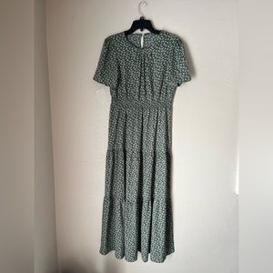 Green floral flowy maxi dress with white floral design key hole back